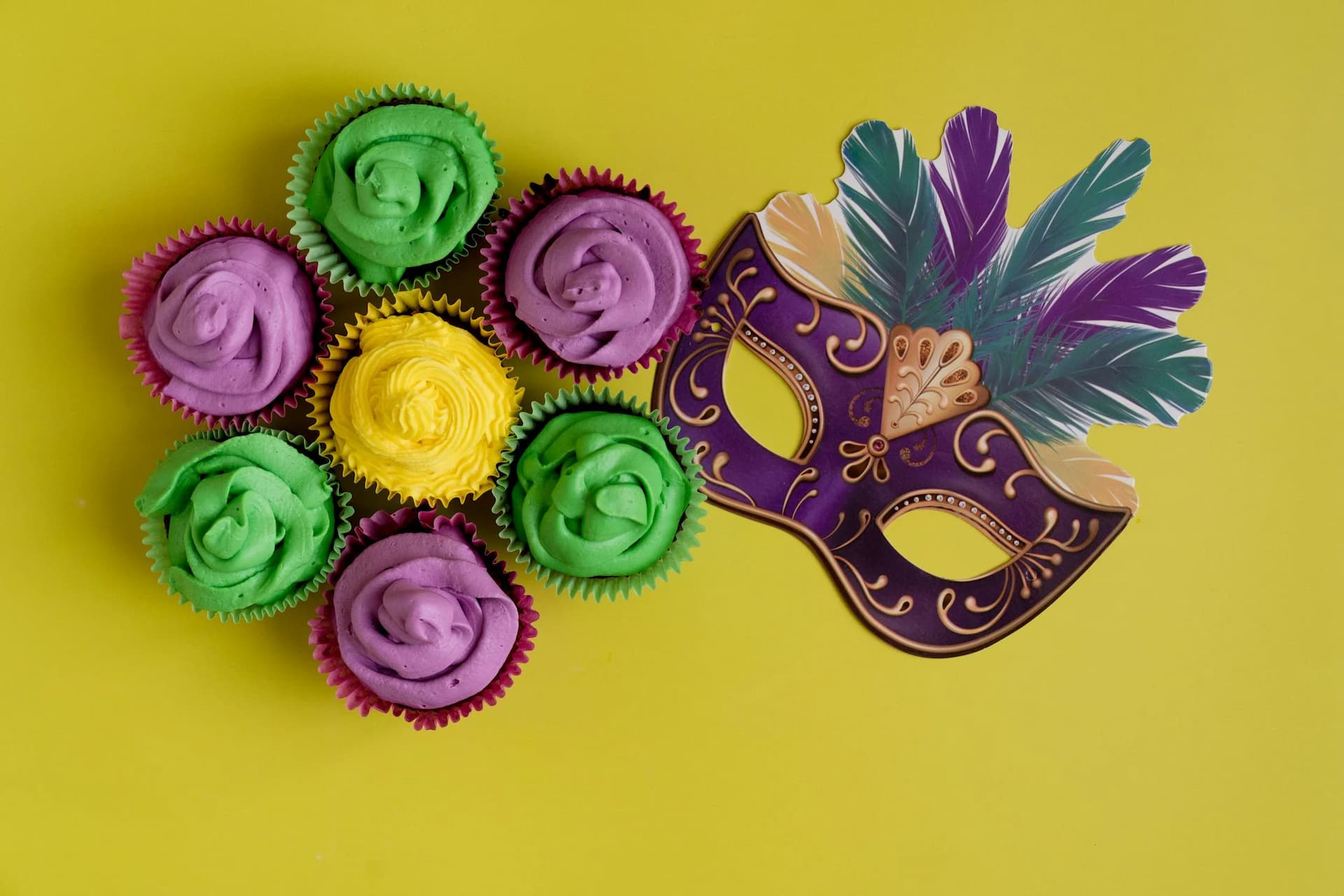 Image of a mask and cupcake